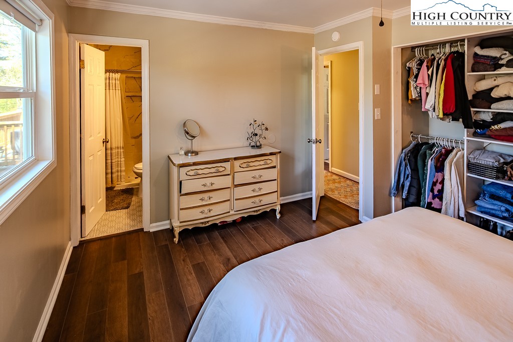 477 Hardaman Circle Boone, NC 28607 - Photo 22 of 48 a bedroom with a bed and a tv