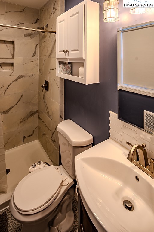 477 Hardaman Circle Boone, NC 28607 - Photo 28 of 48 a bathroom with a sink toilet and shower