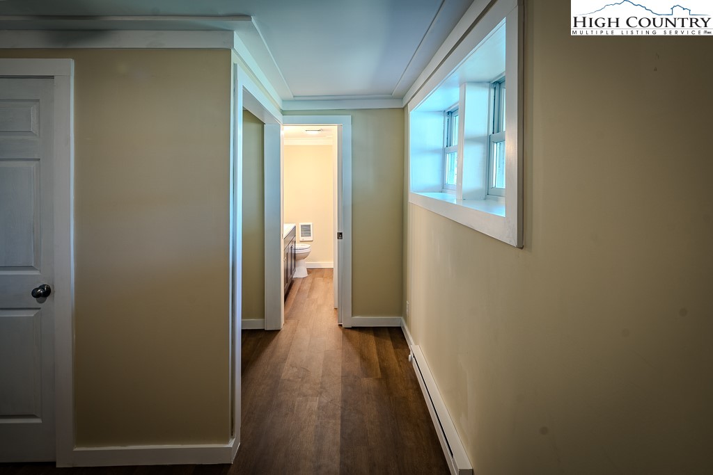 477 Hardaman Circle Boone, NC 28607 - Photo 32 of 48 a view of a room with wooden floor and a window