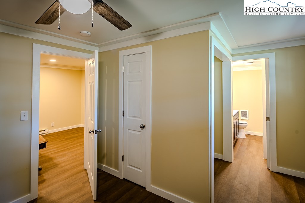 477 Hardaman Circle Boone, NC 28607 - Photo 33 of 48 a view of a hallway with wooden floor