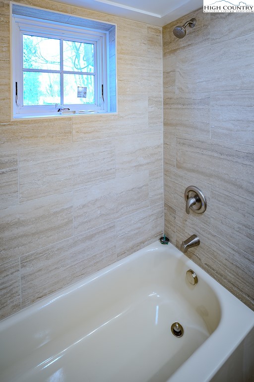 477 Hardaman Circle Boone, NC 28607 - Photo 37 of 48 a bathroom with a tub
