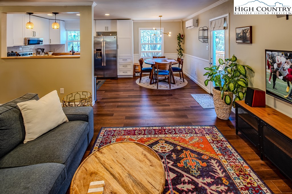 477 Hardaman Circle Boone, NC 28607 - Photo 4 of 48 a living room with furniture and a dining table