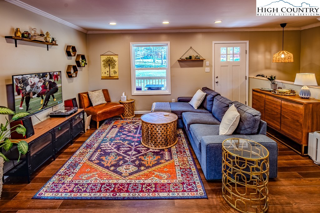 477 Hardaman Circle Boone, NC 28607 - Photo 7 of 48 a living room with furniture and a couch