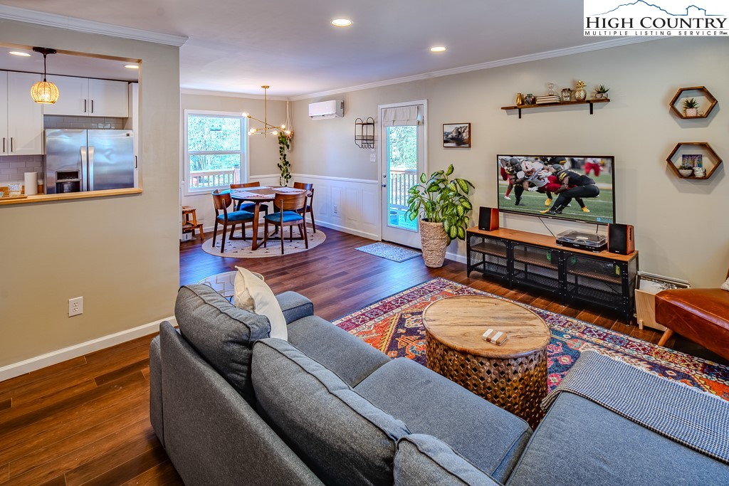 477 Hardaman Circle Boone, NC 28607 - Photo 8 of 48 a living room with furniture and a flat screen tv