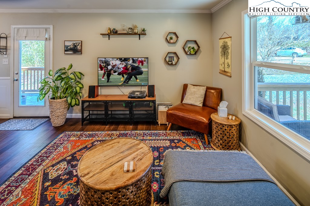 477 Hardaman Circle Boone, NC 28607 - Photo 9 of 48 a living room with furniture and a potted plant