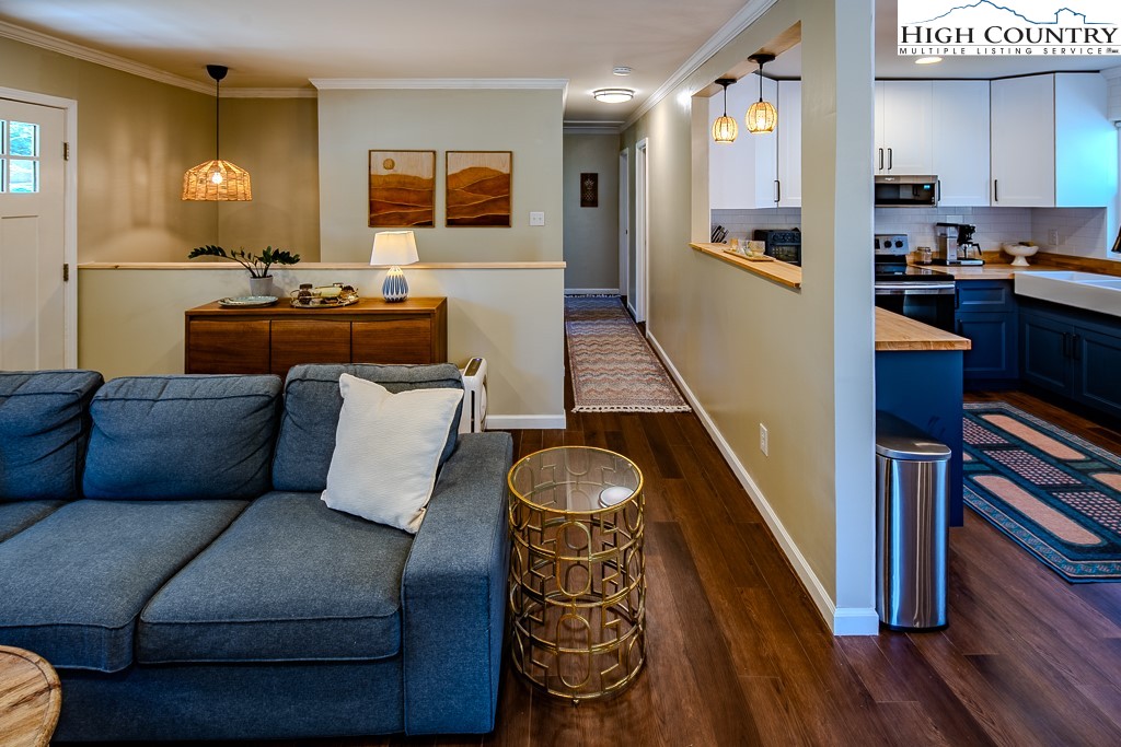 477 Hardaman Circle Boone, NC 28607 - Photo 10 of 48 a living room with furniture and a wooden floor