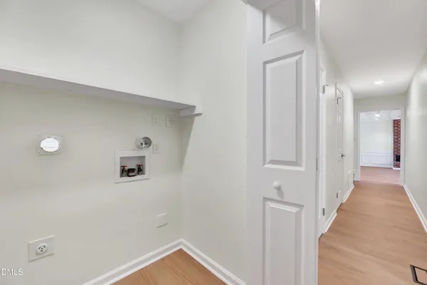 a view of a hallway with closet