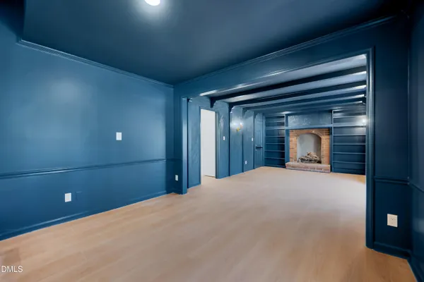 a bedroom with a bed and lamp