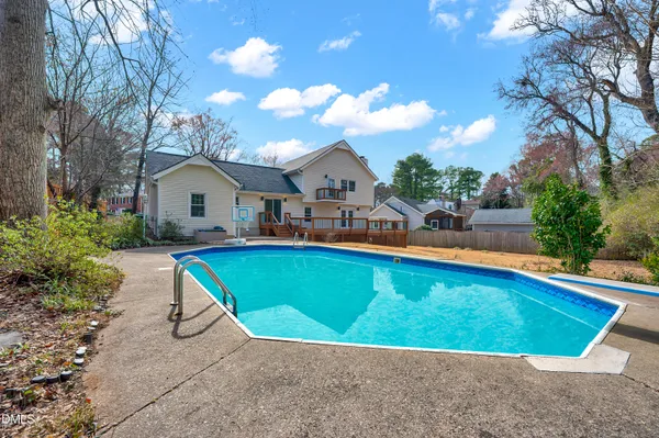a view of outdoor space and swimming pool