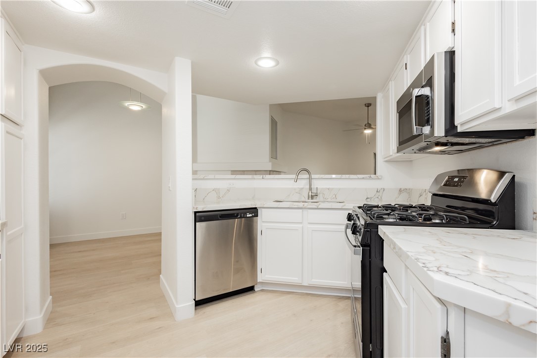 7400 West Flamingo Road, Unit 2033 Las Vegas, NV 89147 - Photo 2 of 38 New stove, microwave, dishwasher, sink, faucet, flooring, baseboards and quartz countertops!