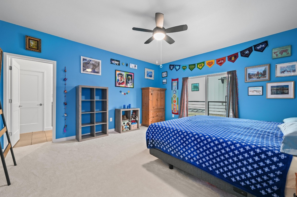 7601 Cooper Lane, Unit 6 Austin, TX 78745 - Photo 17 of 29 a bedroom with a bed and a closet