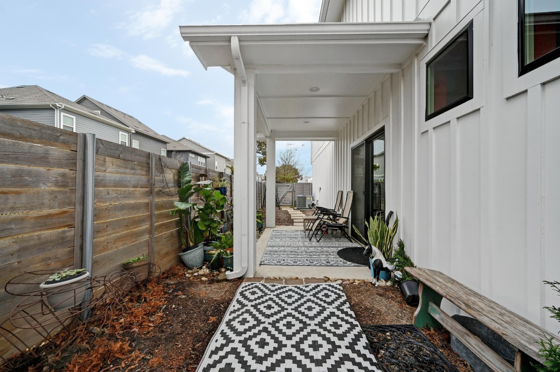 7601 Cooper Lane, Unit 6 Austin, TX 78745 - Photo 27 of 29 a couple of potted plants in front of door