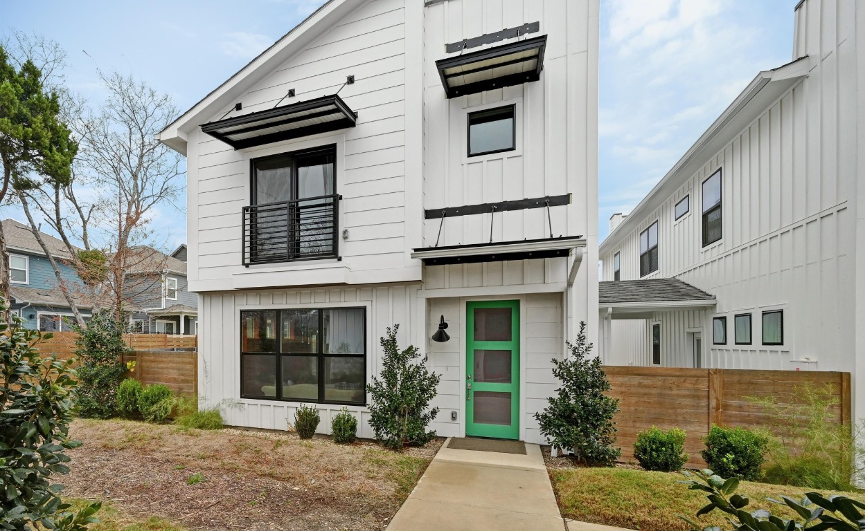7601 Cooper Lane, Unit 6 Austin, TX 78745 - Photo 3 of 29 View of front facade featuring board and batten siding and a balcony