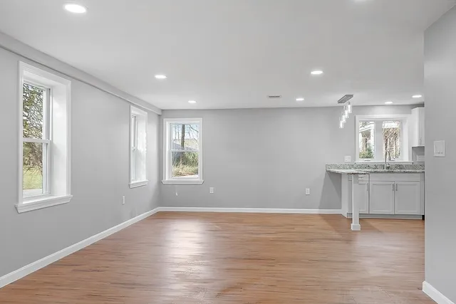 a view of kitchen and windows