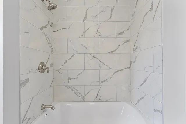 a bathroom with a bathtub