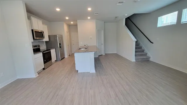 a front view of a building with street view