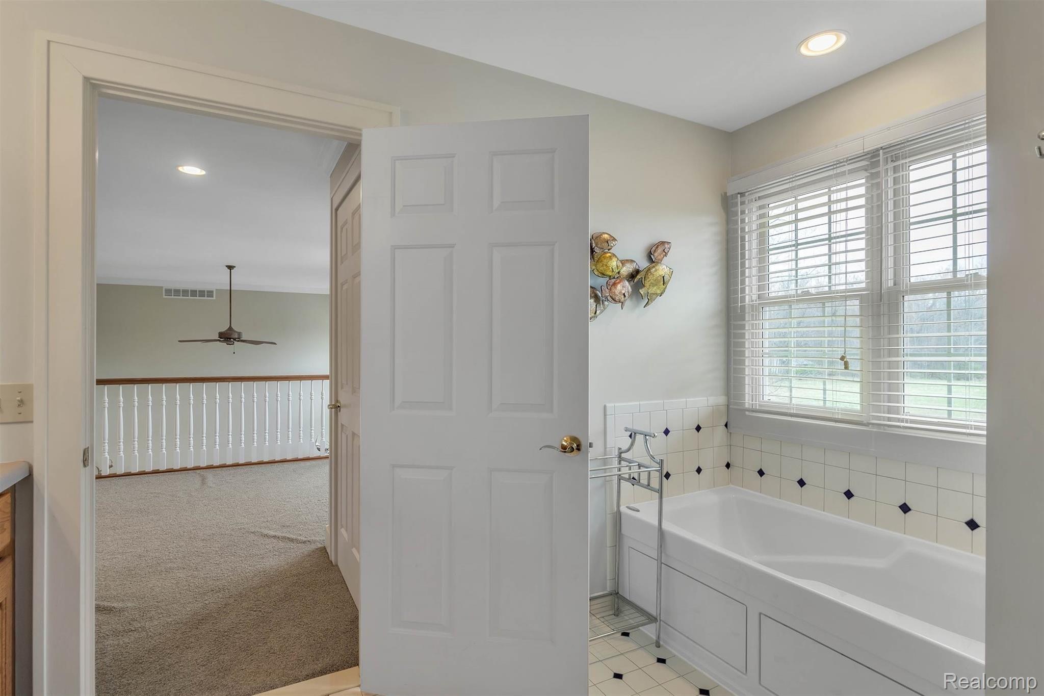 5275 Dansville Road Stockbridge, MI 49285 - Photo 45 of 85 Loft full bath with jacuzzi tub and separate shower.