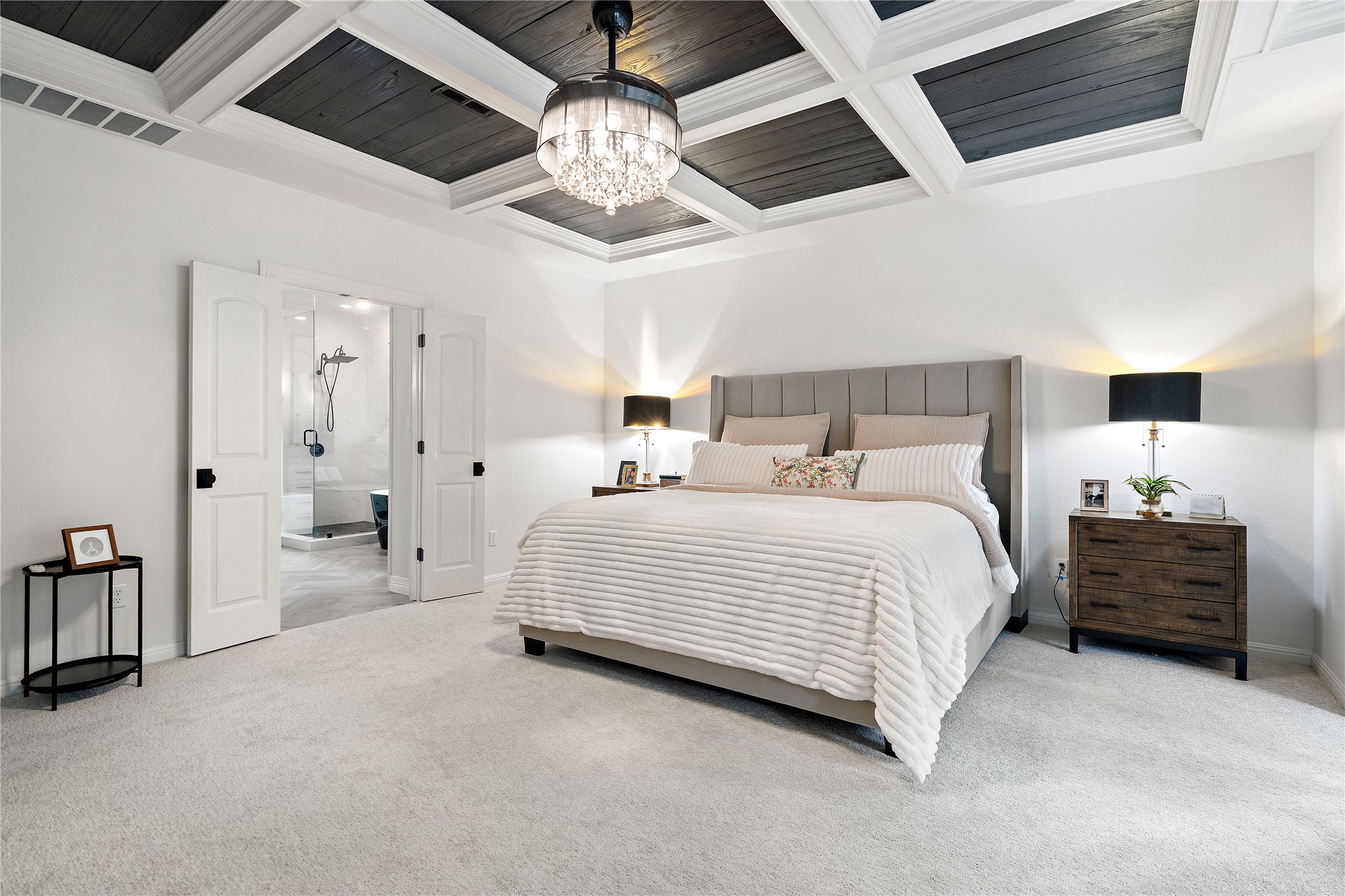 2829 Long Lasso Pass Leander, TX 78641 - Photo 18 of 40 a spacious bedroom with a bed and ceiling fan