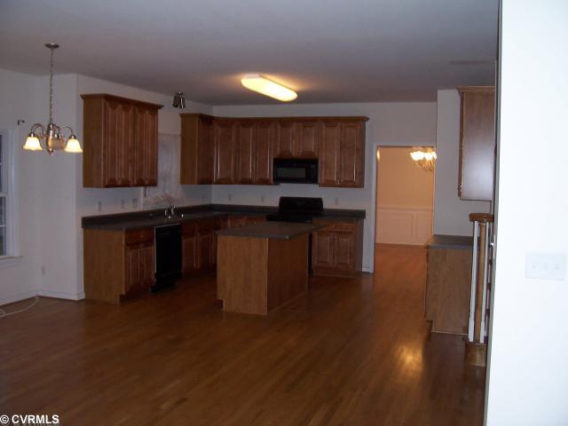 612 Carldan Road Richmond, VA 23227 - Photo 5 of 8 Kitchen - Hardwood Flooring Kitchen Island