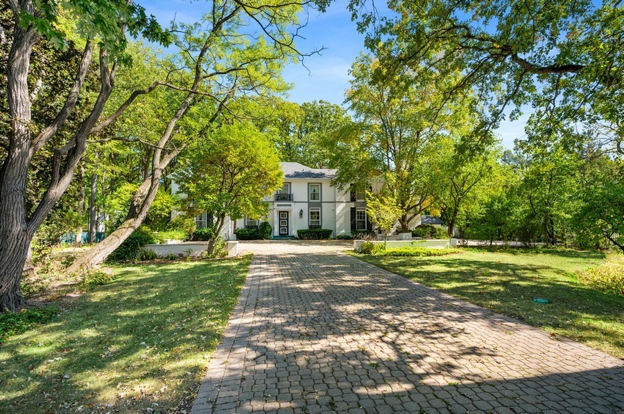 a view of a trees in front of a house