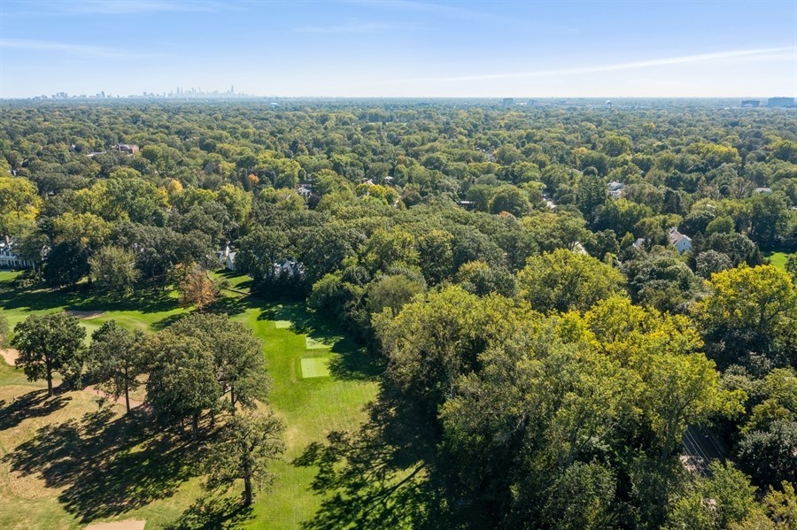 39 Locust Road Winnetka, IL 60093 - Photo 11 of 16 an aerial view of residential houses with outdoor space and trees