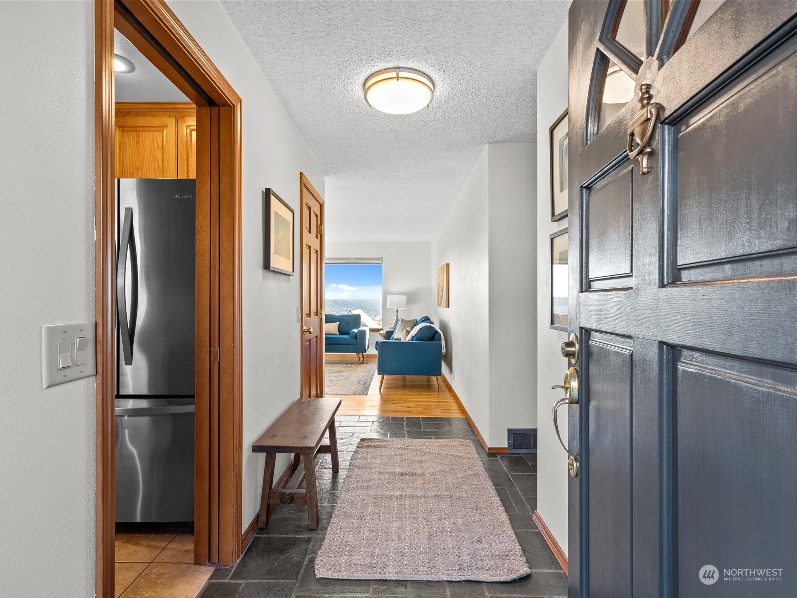 801 Grant Avenue South Renton, WA 98057 - Photo 4 of 40 a walk in closet with wooden floor
