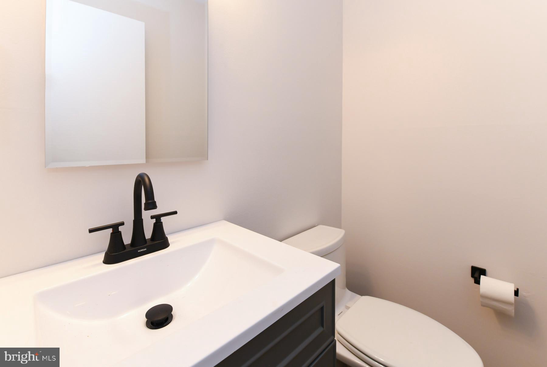 10 Ivy Lane Sicklerville, NJ 08081 - Photo 24 of 30 a bathroom with a sink and a toilet