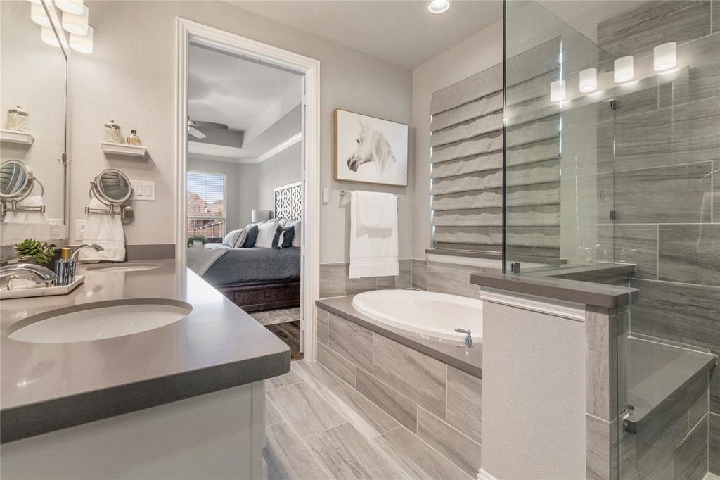 6201 Cupleaf Road Flower Mound, TX 76226 - Photo 12 of 40 a bathroom with a sink and a mirror