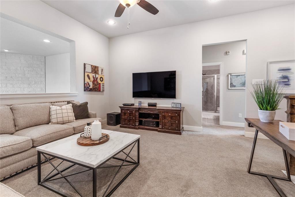 6201 Cupleaf Road Flower Mound, TX 76226 - Photo 16 of 40 a living room with furniture and a flat screen tv