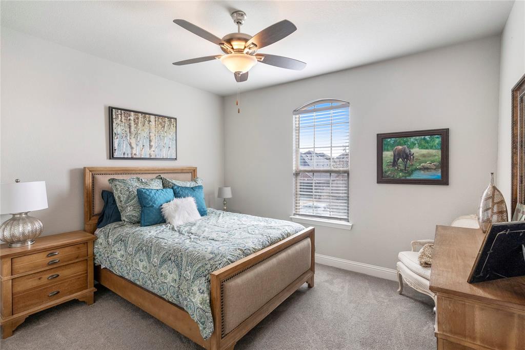 6201 Cupleaf Road Flower Mound, TX 76226 - Photo 22 of 40 a bedroom with a bed and a window