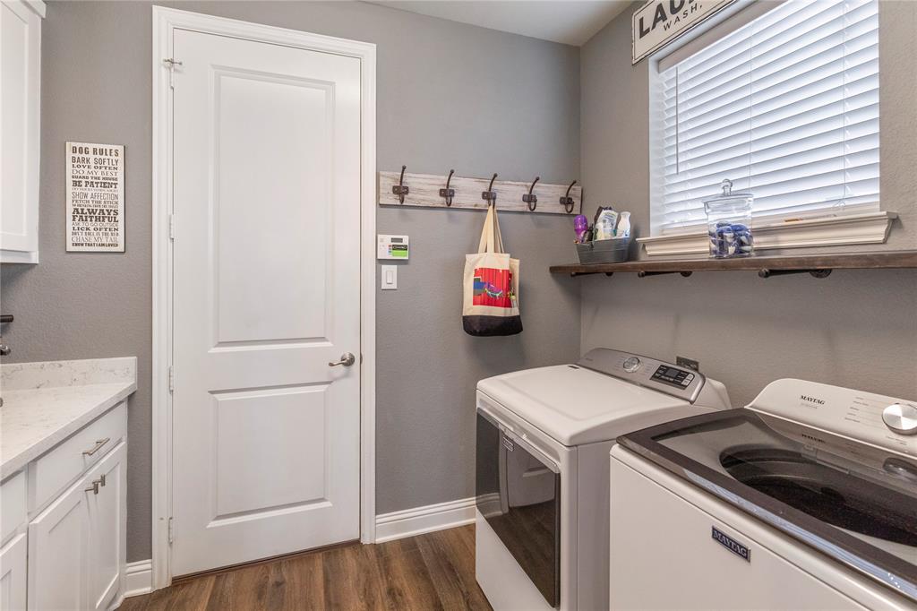 6201 Cupleaf Road Flower Mound, TX 76226 - Photo 24 of 40 a utility room with dryer and washer