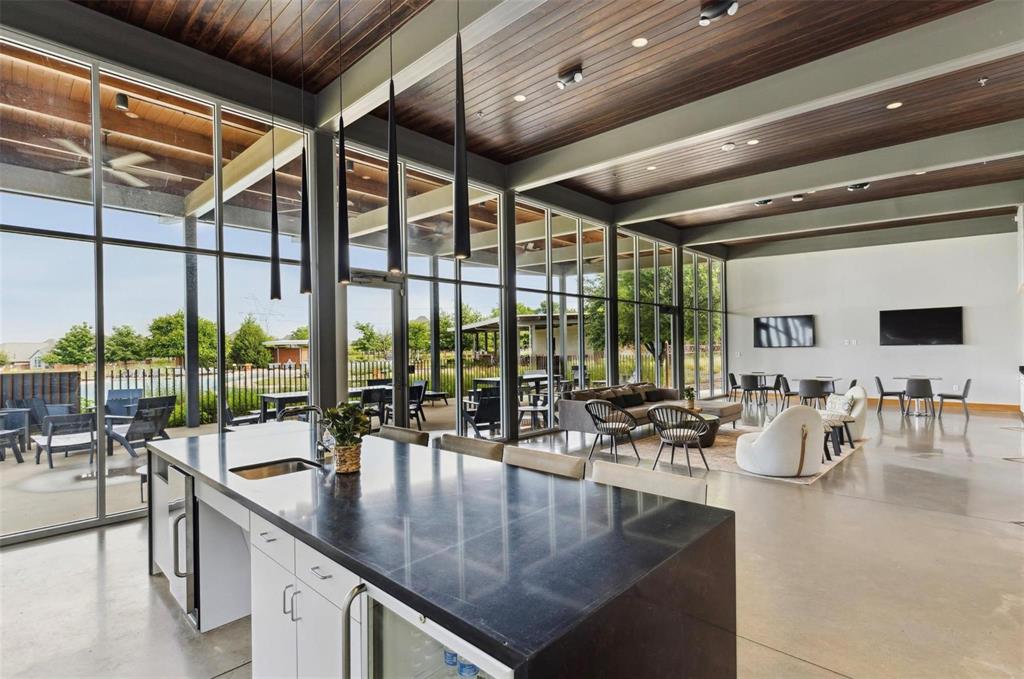 6201 Cupleaf Road Flower Mound, TX 76226 - Photo 33 of 40 a room with lots of table and chairs