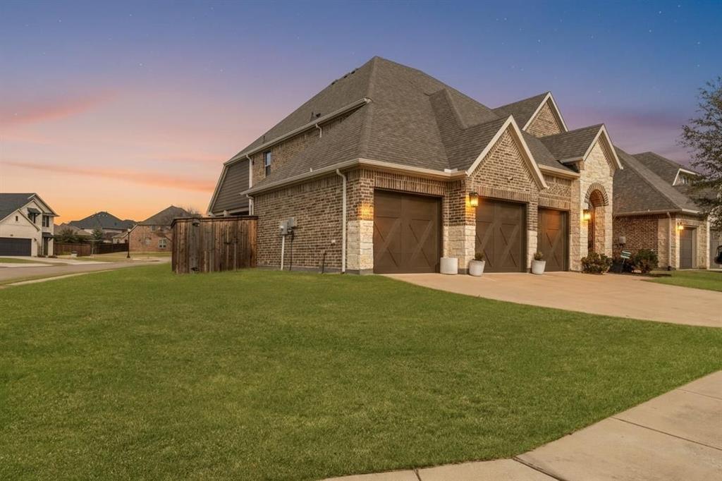 6201 Cupleaf Road Flower Mound, TX 76226 - Photo 39 of 40 a front view of a house with garden
