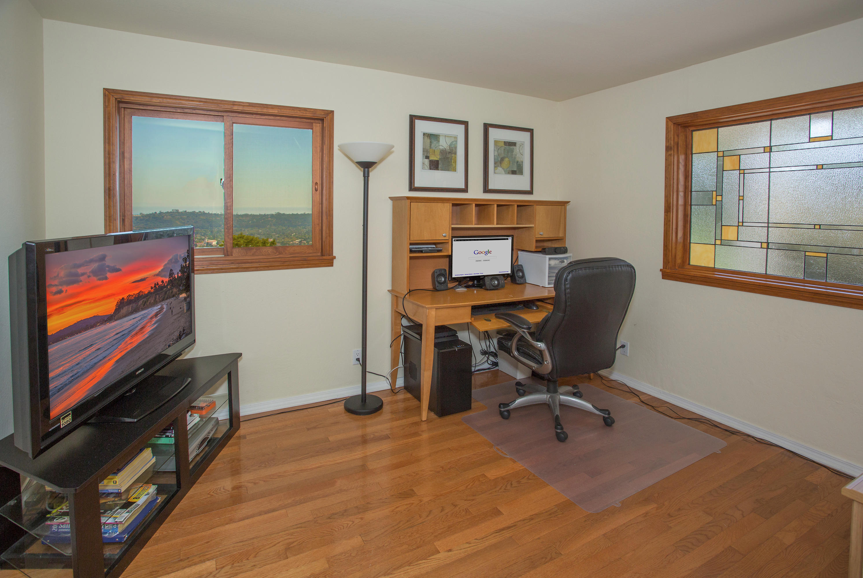 1710 Mission Ridge Road Santa Barbara, CA 93103 - Photo 13 of 19 a view of a workspace with furniture and a window