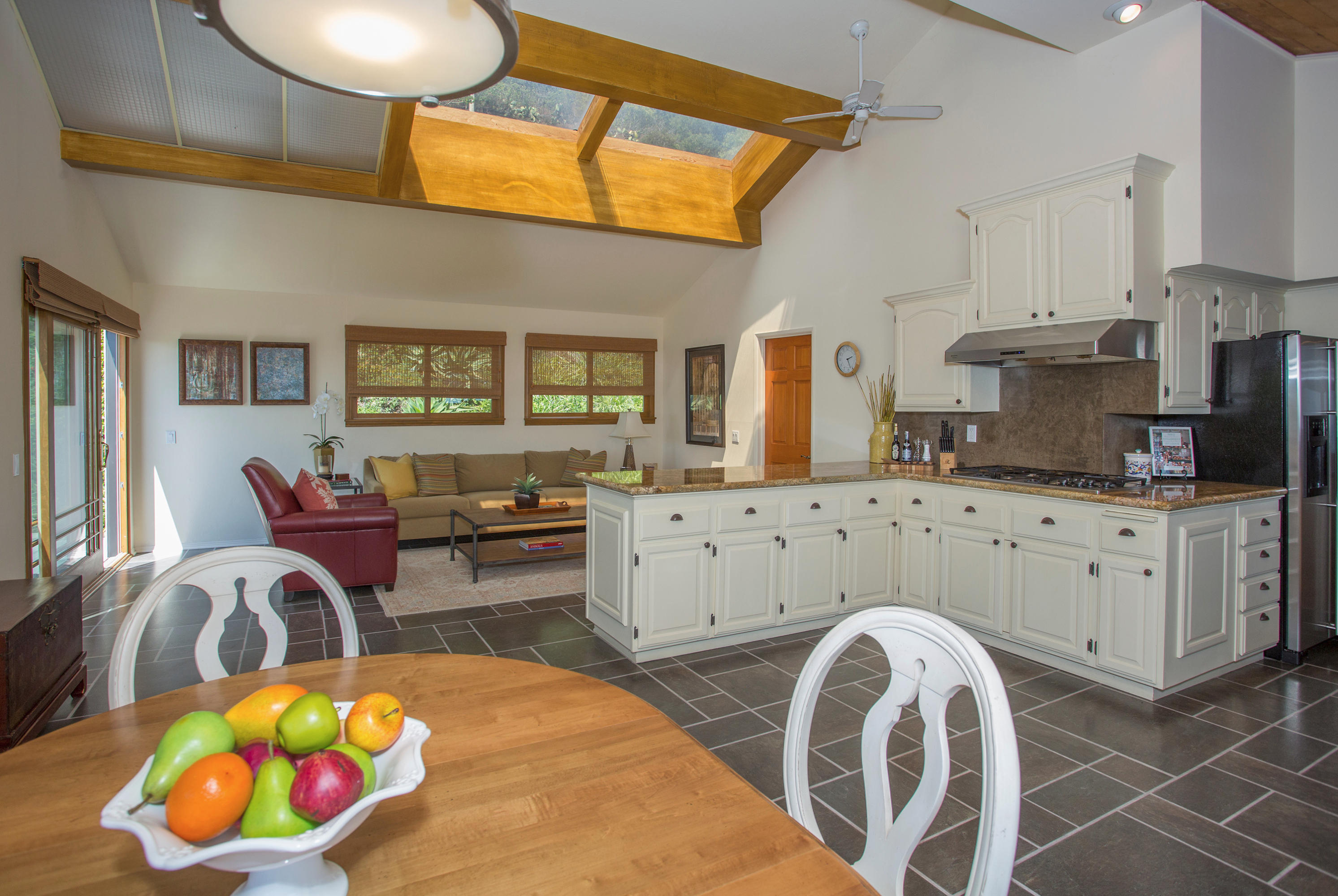 1710 Mission Ridge Road Santa Barbara, CA 93103 - Photo 5 of 19 a living room with furniture a dining table and kitchen view