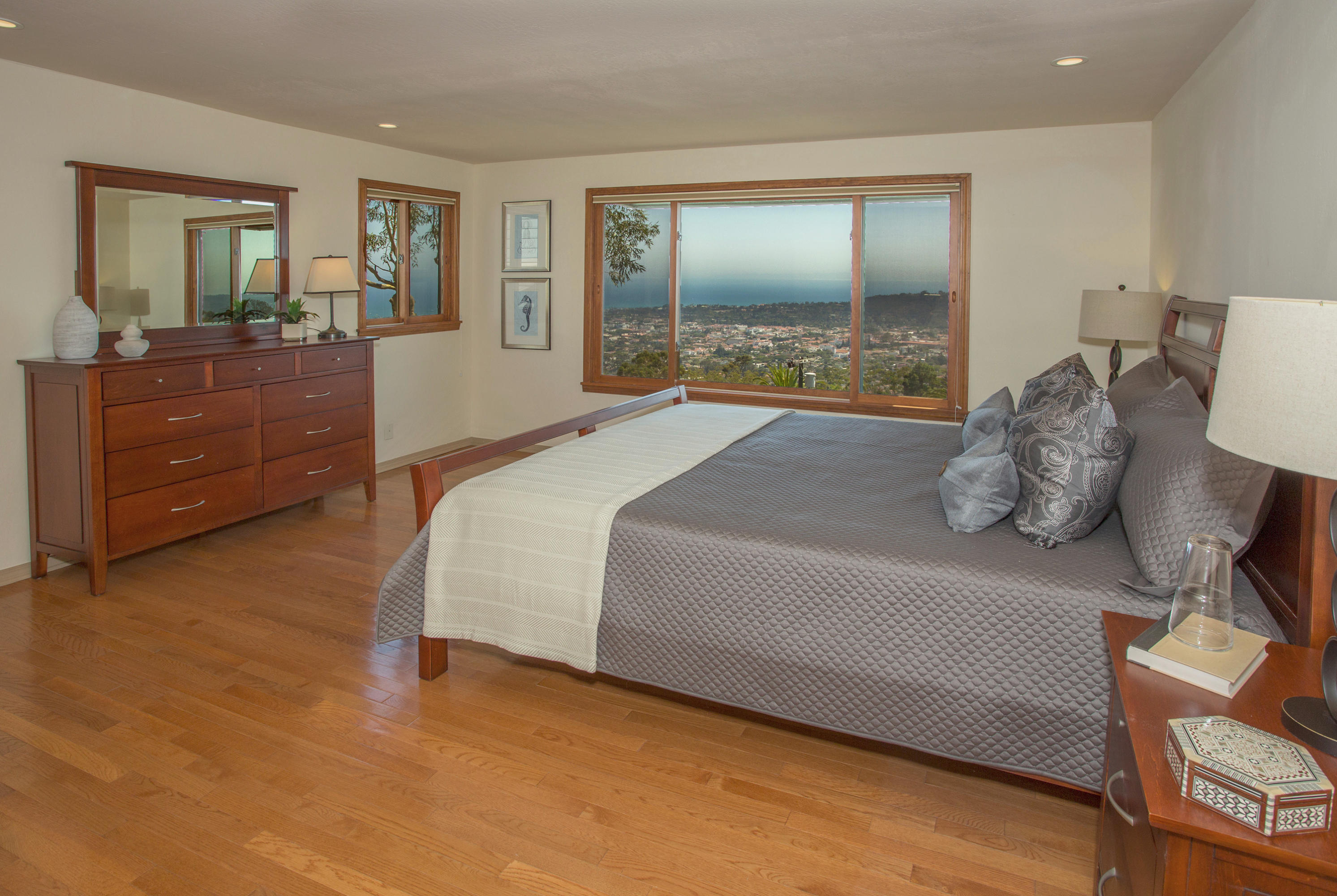 1710 Mission Ridge Road Santa Barbara, CA 93103 - Photo 7 of 19 a bedroom with a large bed and a dresser