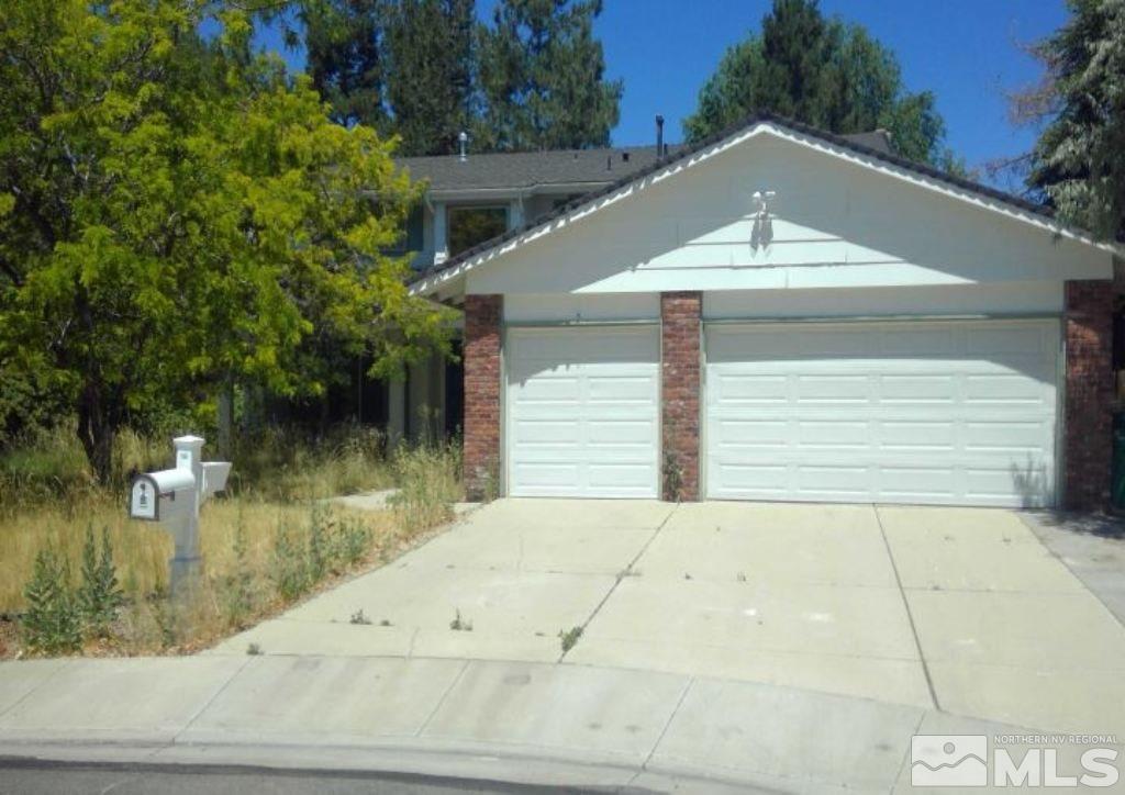 975 Twin Pines Road Reno, NV 89509 - Photo 1 of 1 a front view of a house with a yard