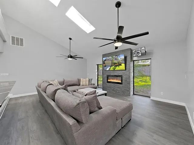 a living room with furniture and a window