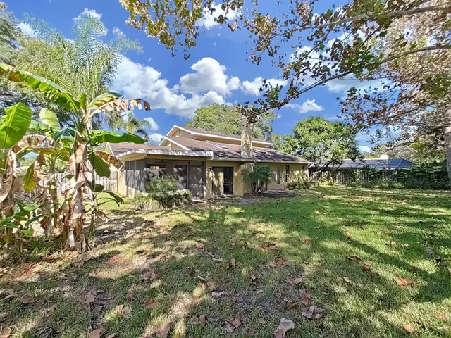 a view of sign board and yard