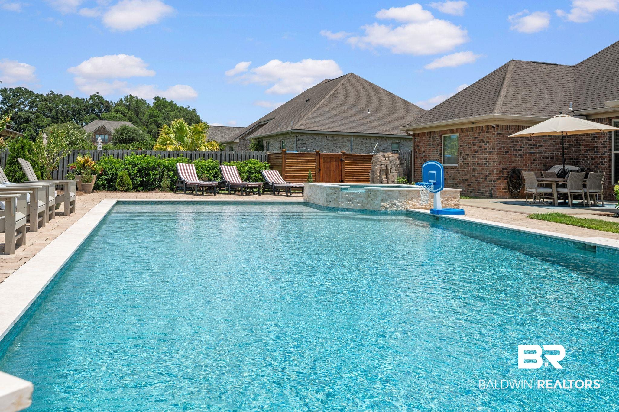 409 Fortune Drive Fairhope, AL 36532 - Photo 39 of 42 Expansive backyard featuring a rectangular swimming pool with integrated spa