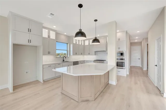 a view of a hallway with workspace