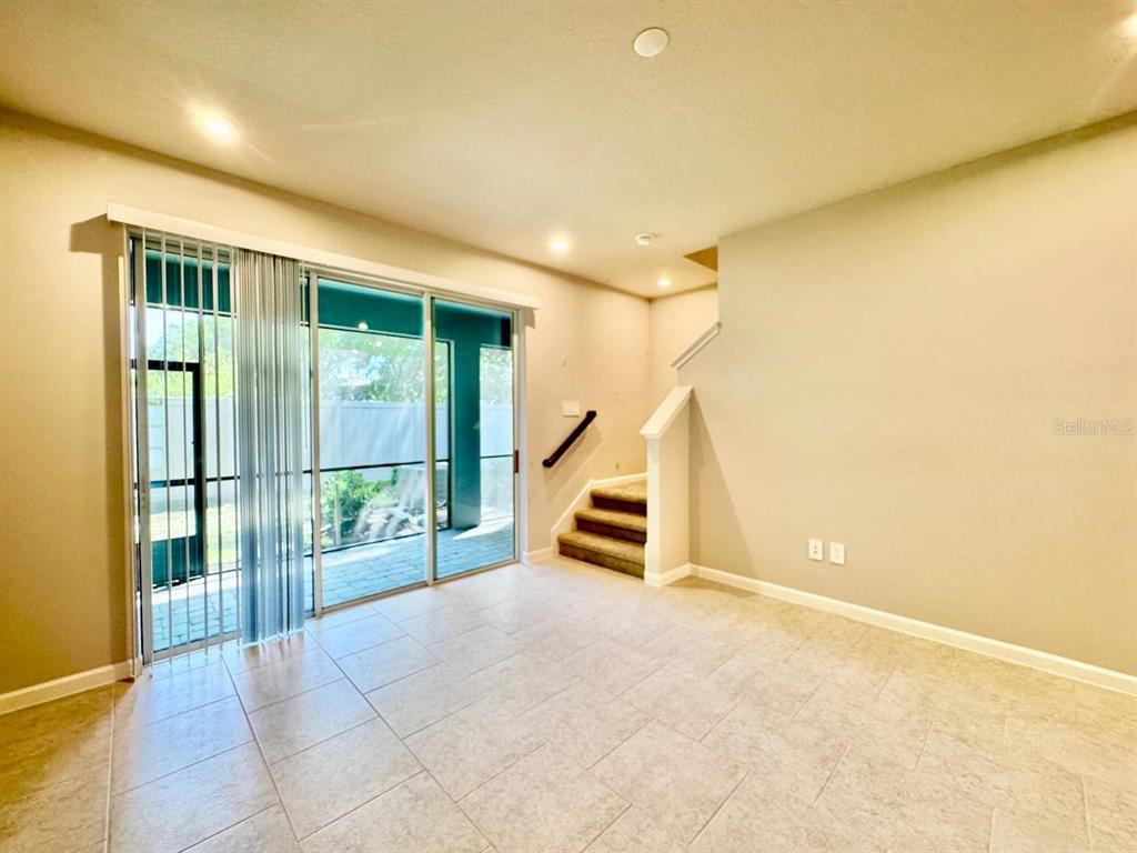 3247 Feather Hvn Place Brandon, FL 33511 - Photo 12 of 34 a view of an empty room with a fireplace