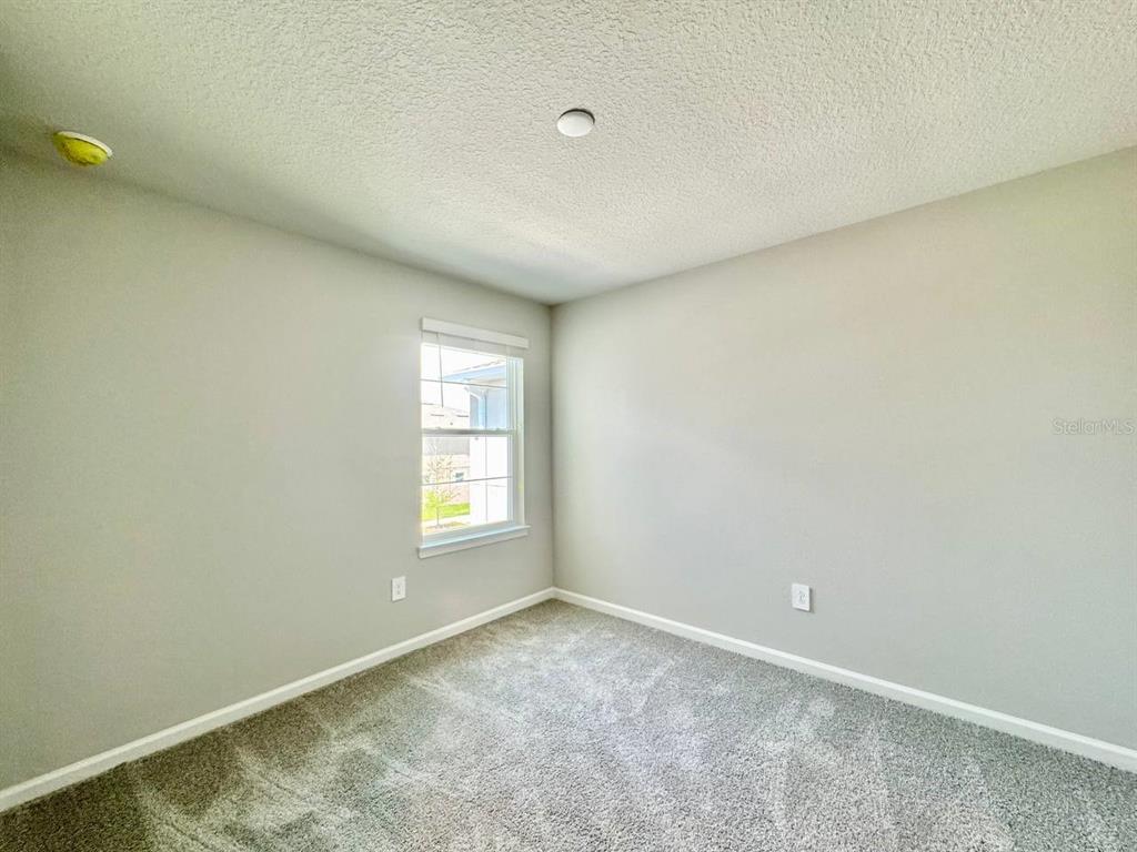 3247 Feather Hvn Place Brandon, FL 33511 - Photo 16 of 34 a view of an empty room and window