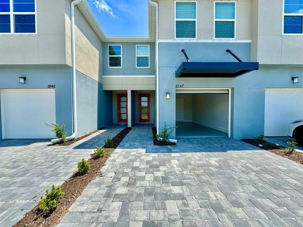 3247 Feather Hvn Place Brandon, FL 33511 - Photo 2 of 34 a house view with a outdoor space