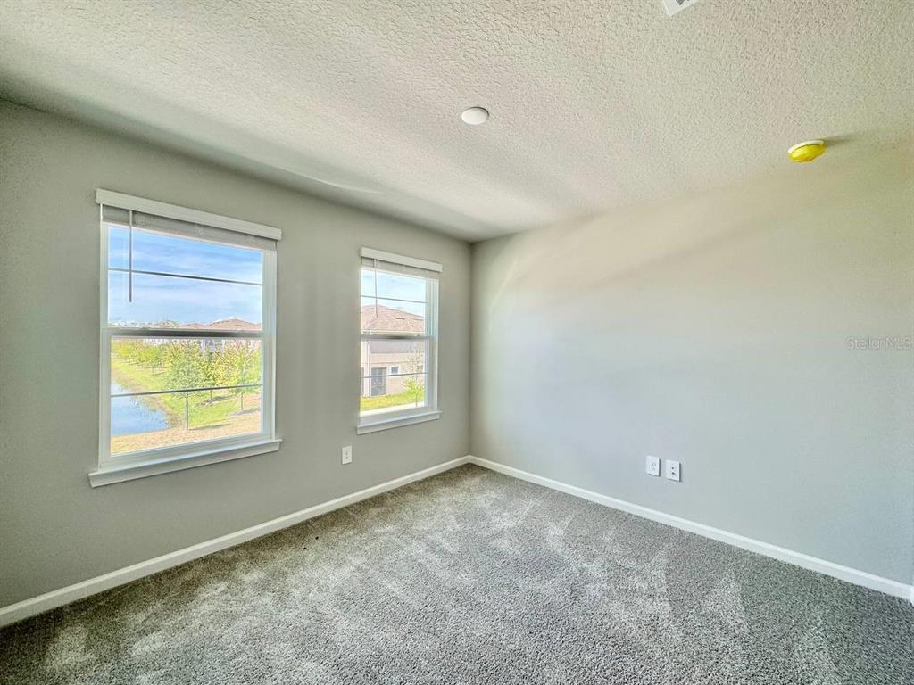 3247 Feather Hvn Place Brandon, FL 33511 - Photo 22 of 34 a view of an empty room with a window