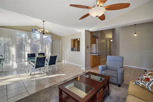 a view of an empty room with a fan