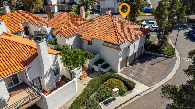 a front view of a house with a garage