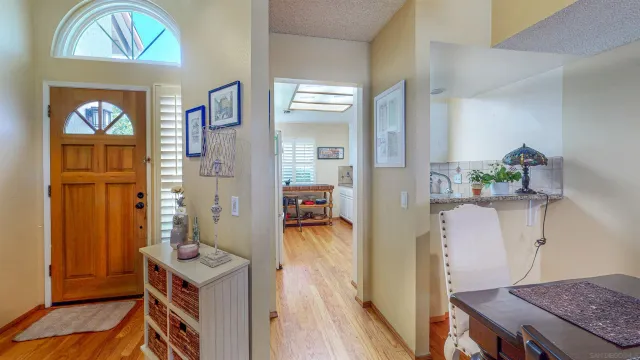 a workspace with furniture and a mirror