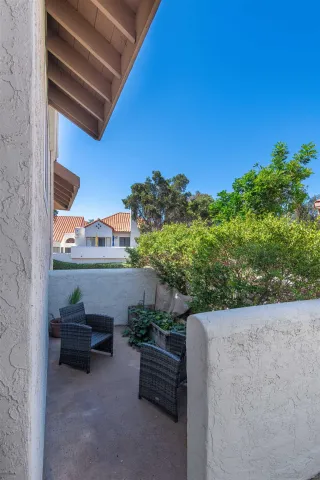 a view of a deck with a backyard