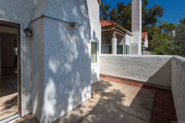 a view of a balcony with an outdoor space